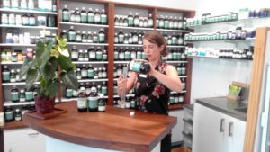 Our Herbalist preparing a herbal tonic in the Bodywise Herbal Dispensary